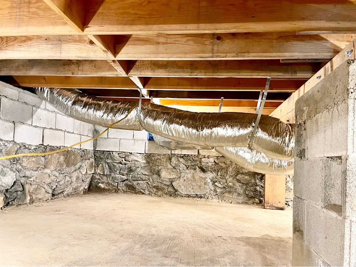Completed crawlspace restoration with all surfaces treated and clean
