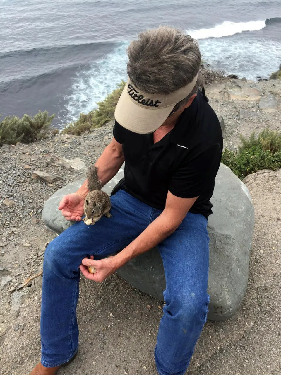 Gregory Jahner feeding rescued squirrels